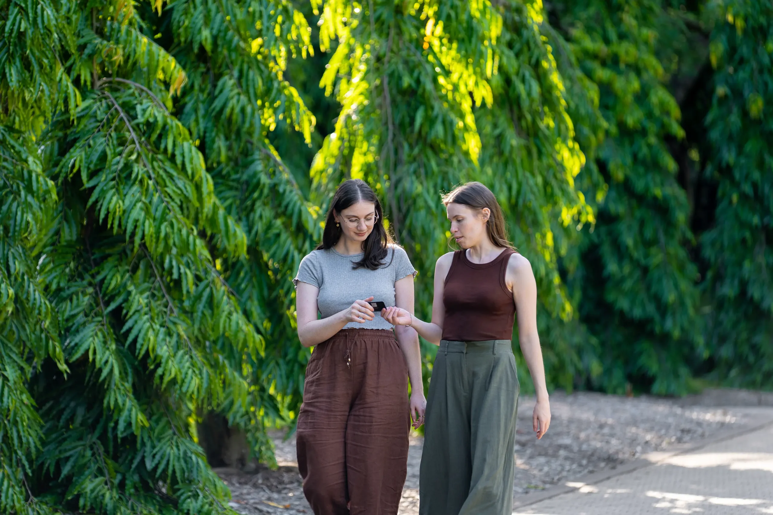 Walking with client, talking and handing business card